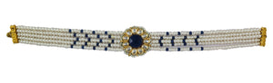 Pearl choker with midnight blue stone